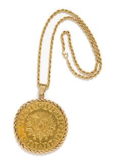 A 14 Karat Yellow Gold and Arabic Coin Pendant, 29.40 dwts.