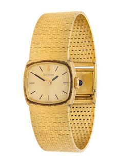 An 18 Karat Yellow Gold Wristwatch, Corum, 30.00 dwts.