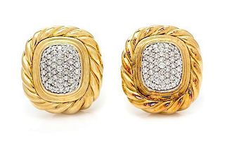 A Pair of 18 Karat Yellow Gold and Diamond Earclips, 16.00 dwts.