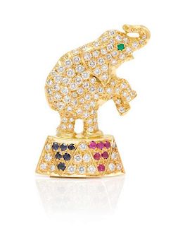 * An 18 Karat Yellow Gold, Diamond, Sapphire, Ruby and Emerald Elephant Motif Pendant/Brooch, 14.60 dwts.