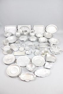 Collection of 63 Aluminum Tableware Pieces, Candle Sticks, Dishes, Trays