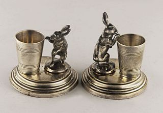 Pair of bronze toothpick holder rabbits on an oval base