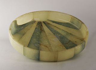 Dispossessing plate alabaster
