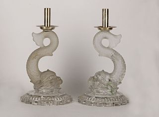 Pair of sealed Baccarat candlesticks in crystal and metal. 