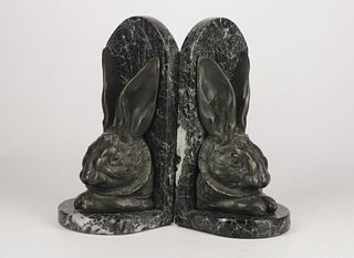 Pair of English bronze rabbit head bookends on green alpi marble by Alfred Gilbert