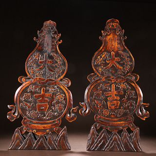 PAIR OF TANXIANG WOOD CARVED ORNAMENTS