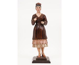EARLY CARVED FIGURE OF A WOMAN