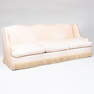 Large Brass Studded Cream Upholstered Wingback Sofa, designed by Daniel Romualdez                  