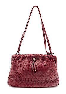 * A Bottega Veneta Red Leather Quilted Handbag, 10" x 7" x 2"