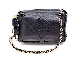 A Chanel Black Quilted Lambskin Camera Case, 8" x 5.5" x 2".