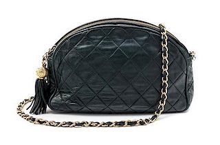 A Chanel Emerald Green Quilted Leather Shoulder Bag, 9.5" x 6" x 2".