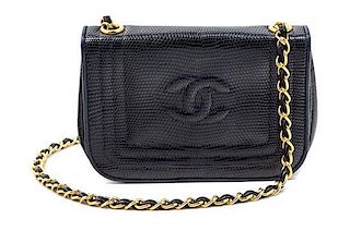 * A Chanel Navy Lizard Flap Handbag, 6.5" x 4.5" x 1.5".