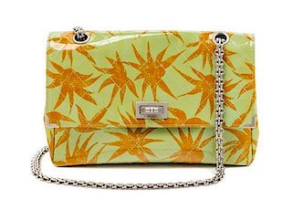 * A Chanel Tropical Patent Mademoiselle Clasp Handbag, 10" x 6.5" x 2".