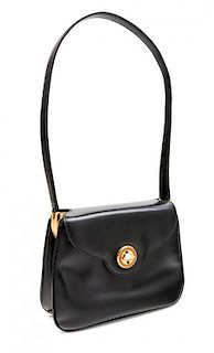 * A Gucci Black Handbag with Decorative Clasp, 10" x 7.5" x 2"