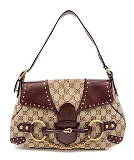 A Gucci Horsebit Handbag, 13" x 7" x 2".