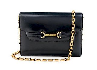 * A Gucci Navy Handbag, 7.5" x 5.5" x 1.5"