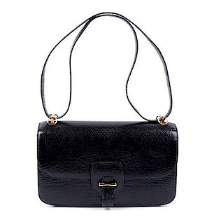 * An Hermes Black Lizard Handbag, 9.5" x 5.5" x 3".