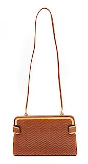 * A Judith Leiber Brown Leather Handbag, 9.5" x 6.5" x 1"