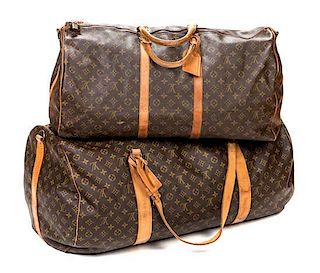 A Pair of Louis Vuitton Duffle Bags, 24" x 12" x 10.5"