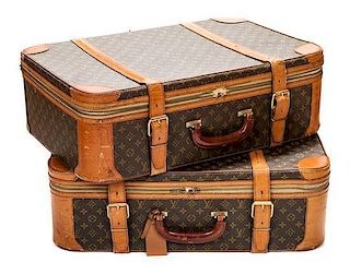 * A Pair of Louis Vuitton Monogram Canvas Hardsided Suitcases, 27"x 18"x 8.5"