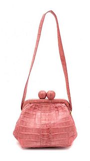 * A Nancy Gonzalez Coral Skin Handbag, 7" x 5.5" x 3".