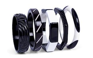 A Group of Five Black and White Bakelite Bangles,