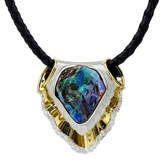 Large Black Opal, Platinum and 18 Karat Yellow Gold Pendant Necklace accented with Round Brilliant Cut Diamonds and suspended