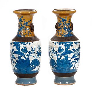 Pair of Chinese Blue & White Vases Mounted as Lamps.