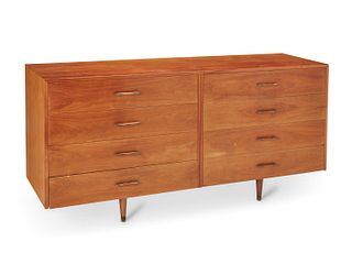 A KalpE modern walnut chest of drawers Mid-20th century; Inglewood, CA 32.5" H x 67.75" W x 20" D