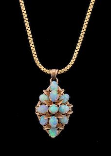 Opal and gold pendant and necklace, the pendant set with 11 cabochon cut opals, chain tested as 18 ct gold.