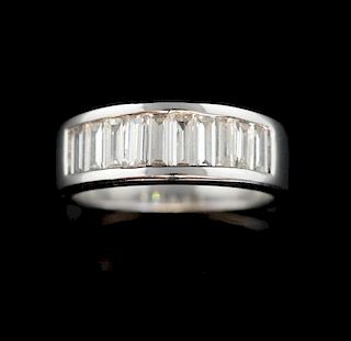 Diamond half eternity ring, set with ten baguette cut-diamonds in a channel setting, mounted in 18ct white gold. Estimated to
