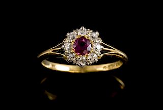 Edwardian ruby and diamond cluster ring in 18 ct yellow gold.
