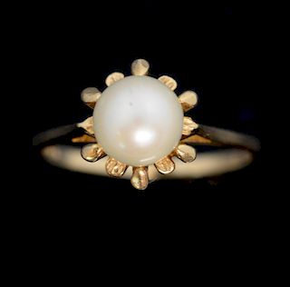Pearl flower ring, set with a cultured pearl measuring 7.50 mm within a gold surround mounted in yellow metal, tested  as 10 
