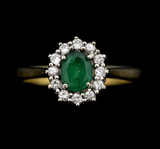 Emerald and diamond cluster ring, mounted in 18ct gold.