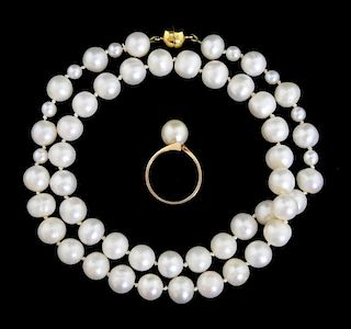 Single row cultured pearl necklace, the pearls 9-9.3 mm diameter, top section interspersed with smaller pearls, magnetic ball