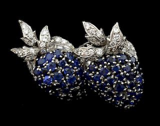 Mid 20th century double blackberry brooch set with blue sapphires and diamond detail to each top. Mounted in platinum