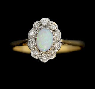 Opal and diamond cluster ring, mounted in 18 ct yellow gold and platinum setting.