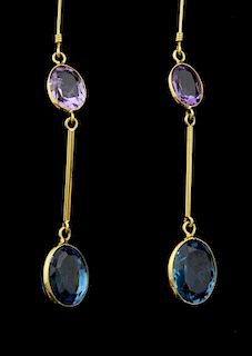 Blue topaz and amethyst drop earrings, the faceted oval stones set in 14 ct gold, 6 cm drop