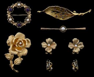 Four brooches, including a 14ct gold and diamond flower brooch, amethyst and pearl 9ct gold brooch, Mikimoto 15ct gold pearl 