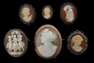 Six shell cameo brooches Victorian and later, two in 9 ct gold frames.