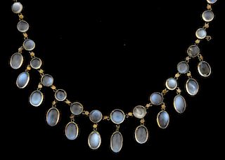 Early 20th C moonstone fringe necklace, set with round and oval cabochon cut moonstones. Clasp missing.