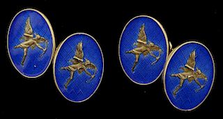 Asprey & Garrard, a pair of silver and enamel cufflinks, with figure of Eros on blue enamel, boxed.