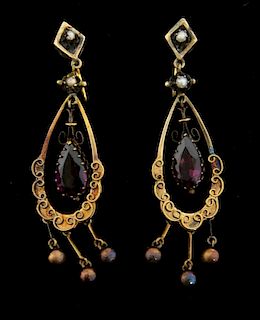Victorian amethyst and gold drop earrings, oval shape pear shape amethyst suspended from the middle with seed pearl detail to