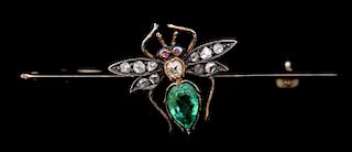 Victorian emerald and diamond bug bar brooch, the body set with a pear shape emerald and diamond set wings in a silver settin