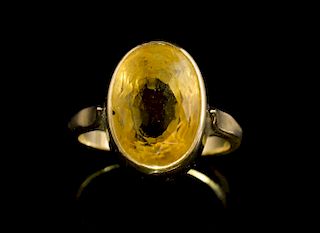 Citrine and gold dress ring, in yellow metal tested as 9 ct