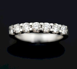 Diamond half eternity ring, set with seven round brilliant cut diamonds, mounted in 18ct white gold. Estimated total diamond 