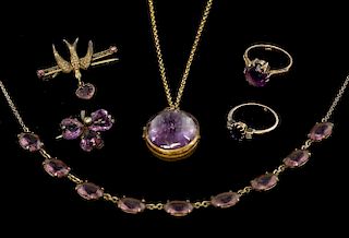An collection of amethyst jewellery, including a 15ct gold amethyst and diamond ring, a 9 ct gold and amethyst ring, three le