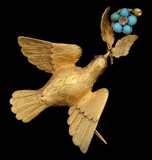 Victorian gold and turquoise bird with ruby set eyes brooch, a forget-me-not spray in its beak