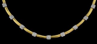 Gold and diamond necklace set with nine square pave set diamond sections with flat polished gold links. Mounted in 18 ct yell