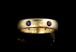 Contemporary gold ring inset with sapphire, amethyst, peridot and other coloured gems, 9 ct gold